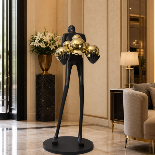 Matte Black Human Figure Floor Sculpture with Mirror‑Gold Spheres